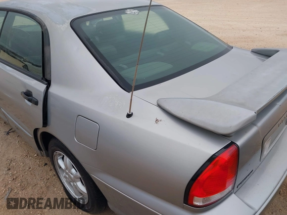 2002 Mitsubishi Diamante z VIN 6MMAP87P82T022689, wystawiony jako IAAI lot #41193483 z przebiegiem 107 022 mil mil oraz . Historia ofert i sprzedaży dostępna na DreamBid. Obrazek 6.