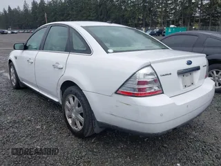 2008 Ford Taurus Limited with VIN 1FAHP25W98G158112, listed as a IAAI auction lot 41992172 with 300,719 mi miles. Bid and sale history available at carsss.com. Image 3.