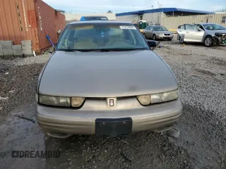 1997 Oldsmobile Cutlass Supreme S z VIN 1G3WH52M8VF352117, wystawiony jako Copart lot #41919094 z przebiegiem 155 523 mil mil oraz Szkody całkowita. Historia ofert i sprzedaży dostępna na DreamBid. Obrazek 5.