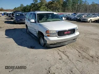 2006 GMC Yukon SLT z VIN 1GKEC13Z46J103782, wystawiony jako Copart lot #84412634 z przebiegiem 201 289 mil mil oraz Szkoda całkowita • Salvage title. Historia ofert i sprzedaży dostępna na DreamBid. Obrazek 11.