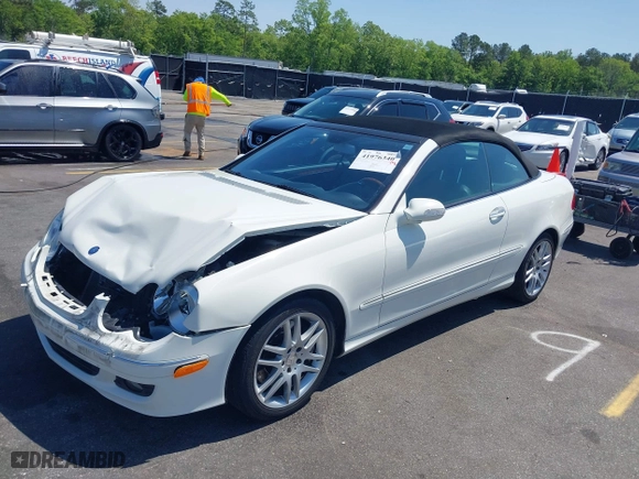 2009 Mercedes-Benz CLK-Class 3.5L with VIN WDBTK56F09T104434, listed as a IAAI auction lot 41976340 with 58,710 mi miles. Bid and sale history available at carsss.com. Image 2.