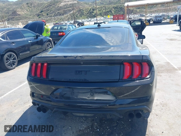 2021 Ford Mustang GT z VIN 1FA6P8CF4M5149580, wystawiony jako IAAI lot #41878355 z przebiegiem 60 028 mil mil oraz . Historia ofert i sprzedaży dostępna na DreamBid. Obrazek 16.