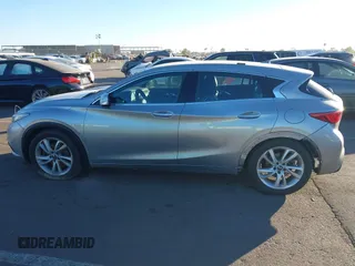 2018 Infiniti QX30 Luxury with VIN SJKCH5CPXJA057522, listed as a IAAI auction lot 41070985 with 79,007 mi miles and . Bid and sale history available at DreamBid. Image 14.