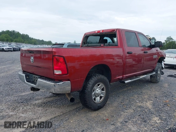 2014 Ram 2500 Tradesman z VIN 3C6UR5CL9EG187100, wystawiony jako IAAI lot #42373397 z przebiegiem 214 720 mil mil oraz . Historia ofert i sprzedaży dostępna na DreamBid. Obrazek 4.