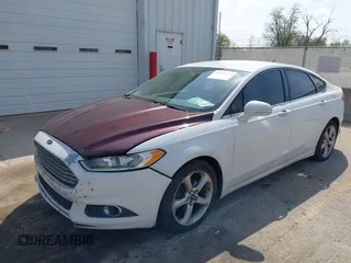 2013 Ford Fusion SE with VIN 3FA6P0HR3DR182796, listed as a IAAI auction lot 42147273 with 121,815 mi miles and . Bid and sale history available at DreamBid. Image 2.