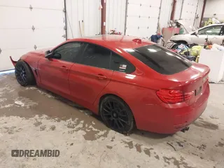 2015 BMW 4 Series 428i with VIN WBA4A9C52FGL85049, listed as a IAAI auction lot 41649475 with 100,443 mi miles and . Bid and sale history available at DreamBid. Image 3.