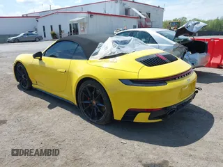 2022 Porsche 911 Carrera S z VIN WP0CB2A92NS245314, wystawiony jako IAAI lot #42086408 z przebiegiem 29 193 mil mil oraz . Historia ofert i sprzedaży dostępna na DreamBid. Obrazek 3.
