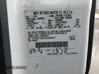 2004 Ford F-150 XL with VIN 1FTRF14W24NA80971, listed as a Copart auction lot 48242325 with 150,293 mi miles and Salvage Title. Bid and sale history available at DreamBid. Image 12.