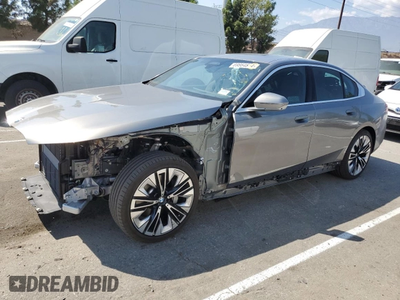 2024 BMW 5 Series 530i with VIN WBA43FJ06RCR20072, listed as a Copart auction lot 69864814 with 4,871 mi miles and Salvage Title. Bid and sale history available at carsss.com. Image 1.