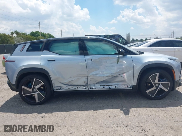 2023 Fisker Ocean One z VIN VCF1ZBU22PG006157, wystawiony jako IAAI lot #41887759 z przebiegiem 3322 mil mil oraz . Historia ofert i sprzedaży dostępna na DreamBid. Obrazek 13.