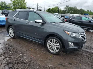 2019 Chevrolet Equinox Premier z VIN 2GNAXYEX8K6142179, wystawiony jako Copart lot #58623525 z przebiegiem 78 025 mil mil oraz Szkoda całkowita • Salvage title. Historia ofert i sprzedaży dostępna na DreamBid. Obrazek 4.