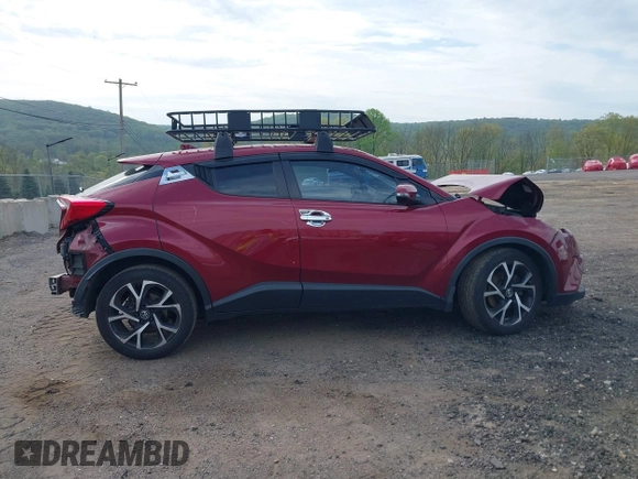 2018 Toyota C-HR XLE with VIN NMTKHMBX7JR010783, listed as a IAAI auction lot 42173610 with 93,320 mi miles and . Bid and sale history available at DreamBid. Image 14.
