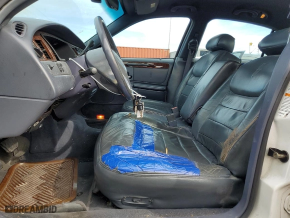 2002 Lincoln Town Car Executive with VIN 1LNHM81W82Y609104, listed as a Copart auction lot 75442374 with 324,612 mi miles and Salvage Title. Bid and sale history available at carsss.com. Image 7.
