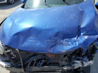 2019 Honda Civic EX z VIN 19XFC1F34KE017631, wystawiony jako Copart lot #53533485 z przebiegiem 55 931 mil mil oraz Szkoda całkowita • Salvage title. Historia ofert i sprzedaży dostępna na DreamBid. Obrazek 11.