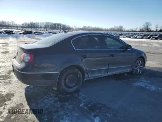 2009 Volkswagen Passat Komfort z VIN WVWJK73C79P056163, wystawiony jako Copart lot #42095525 z przebiegiem 132 709 mil mil oraz Szkoda całkowita • Salvage title. Historia ofert i sprzedaży dostępna na DreamBid. Obrazek 3.