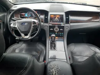 2013 Ford Taurus Limited z VIN 1FAHP2F81DG229944, wystawiony jako Copart lot #63218315 z przebiegiem 199 897 mil mil oraz Czysty tytuł • Clean title. Historia ofert i sprzedaży dostępna na DreamBid. Obrazek 8.