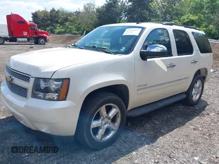 2013 Chevrolet Tahoe LTZ with VIN 1GNSKCE07DR326996, listed as a IAAI auction lot 42203073 with 147,067 mi miles and . Bid and sale history available at DreamBid. Image 17.