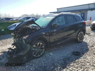 2016 Mazda CX-5 Grand Touring z VIN JM3KE4DY2G0659653, wystawiony jako Copart lot #48033665 z przebiegiem 172 731 mil mil oraz Czysty tytuł • Clean title. Historia ofert i sprzedaży dostępna na DreamBid. Obrazek 1.