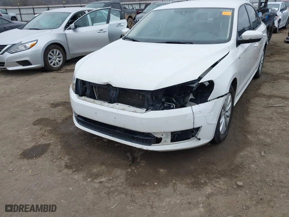 2014 Volkswagen Passat Wolfsburg Ed with VIN 1VWAS7A30EC119833, listed as a IAAI auction lot 41429589 with 181,630 mi miles. Bid and sale history available at carsss.com. Image 6.