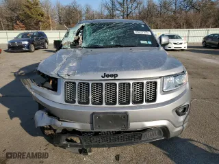 2015 Jeep Grand Cherokee Altitude with VIN 1C4RJFAG0FC136039, listed as a Copart auction lot 89237525 with 124,374 mi miles and Salvage Title. Bid and sale history available at carsss.com. Image 5.