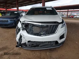 2021 Cadillac XT5 FWD Premium Luxury with VIN 1GYKNCRS5MZ224957, listed as a IAAI auction lot 41794648 with 28,540 mi miles and . Bid and sale history available at carsss.com. Image 12.