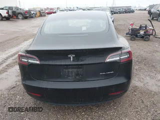 2018 Tesla Model 3 Long Range Battery with VIN 5YJ3E1EB1JF127289, listed as a IAAI auction lot 41484253 with 60,577 mi miles and . Bid and sale history available at DreamBid. Image 16.