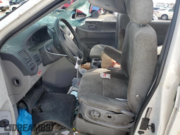 2005 Kia Sedona LX with VIN KNDUP132656684850, listed as a Copart auction lot 80095484 with 182,199 mi miles and Non Repairable. Bid and sale history available at carsss.com. Image 7.