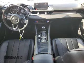 2021 Mazda 6 Touring with VIN JM1GL1VM0M1612027, listed as a Copart auction lot 48262185 with 67,568 mi miles and Salvage Title. Bid and sale history available at DreamBid. Image 8.