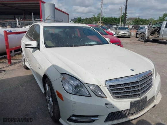 2012 Mercedes-Benz E-Class E 350 Luxury with VIN WDDHF5KB1CA585320, listed as a IAAI auction lot 41982342 with 162,512 mi miles. Bid and sale history available at carsss.com. Image 1.