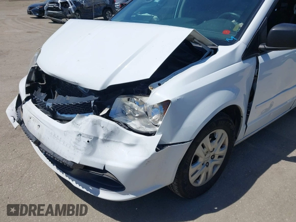 2016 Dodge Grand Caravan SE with VIN 2C4RDGBG2GR311654, listed as a IAAI auction lot 42056032 with 185,330 mi miles and . Bid and sale history available at DreamBid. Image 6.