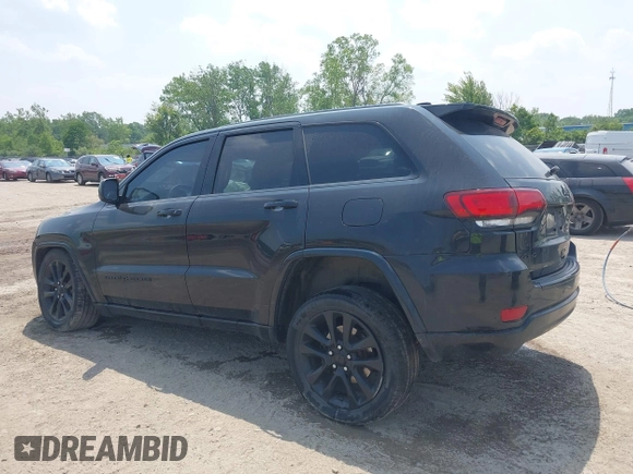 2017 Jeep Grand Cherokee Laredo with VIN 1C4RJFAGXHC818834, listed as a IAAI auction lot 42422744 with 154,287 mi miles and . Bid and sale history available at DreamBid. Image 14.
