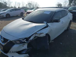 2016 Nissan Maxima SL with VIN 1N4AA6AP2GC387004, listed as a IAAI auction lot 41504524 with 95,437 mi miles and . Bid and sale history available at DreamBid. Image 2.