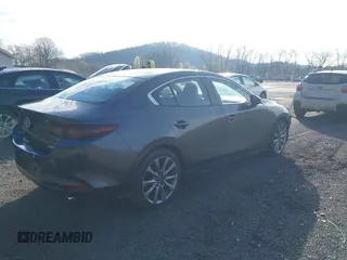2019 Mazda 3 Select with VIN JM1BPACL1K1109354, listed as a IAAI auction lot 41863243 with 58,520 mi miles and . Bid and sale history available at DreamBid. Image 4.