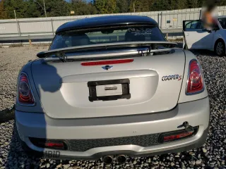 2013 MINI Coupe S z VIN WMWSX3C56DT466756, wystawiony jako Copart lot #80542054 z przebiegiem 95 135 mil mil oraz Szkoda całkowita • Salvage title. Historia ofert i sprzedaży dostępna na DreamBid. Obrazek 6.