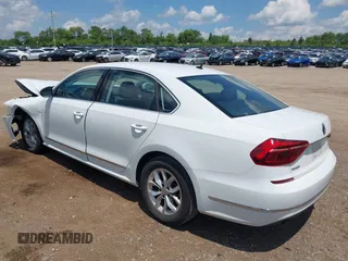 2017 Volkswagen Passat S with VIN 1VWAT7A30HC016932, listed as a IAAI auction lot 42611874 with 100,959 mi miles and . Bid and sale history available at DreamBid. Image 3.