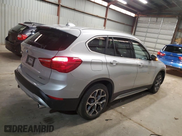 2021 BMW X1 xDrive28i with VIN WBXJG9C01M5T49891, listed as a Copart auction lot 51126685 with 93,696 mi miles and Clean Title. Bid and sale history available at carsss.com. Image 3.