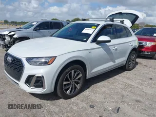 2023 Audi Q5 S line Premium Plus z VIN WA1EAAFY7P2111157, wystawiony jako IAAI lot #41953269 z przebiegiem 14 311 mil mil oraz . Historia ofert i sprzedaży dostępna na DreamBid. Obrazek 18.