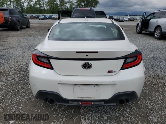 2023 Toyota 86 z VIN JF1ZNBC19P8765430, wystawiony jako Copart lot #56802955 z przebiegiem 6179 mil mil oraz Szkody całkowita. Historia ofert i sprzedaży dostępna na DreamBid. Obrazek 6.