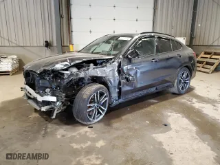 2022 BMW X4 M with VIN 5YM23EC05N9J23246, listed as a Copart auction lot 48730835 with 0 mi miles and Salvage Title. Bid and sale history available at carsss.com. Image 1.