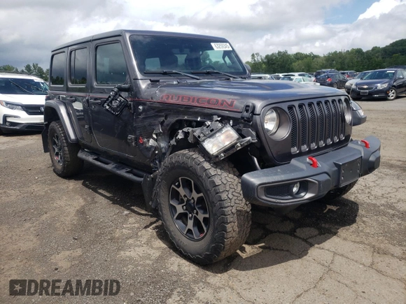 2018 Jeep Wrangler Unlimited Rubicon with VIN 1C4HJXFG1JW261472, listed as a Copart auction lot 63259345 with 60,457 mi miles and Salvage title. Bid and sale history available at DreamBid. Image 4.