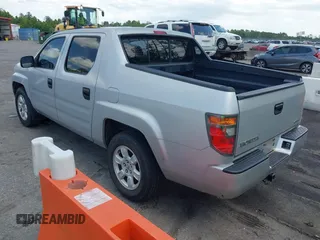 2008 Honda Ridgeline RT with VIN 2HJYK16228H524622, listed as a IAAI auction lot 42445595 with 209,649 mi miles and . Bid and sale history available at DreamBid. Image 3.