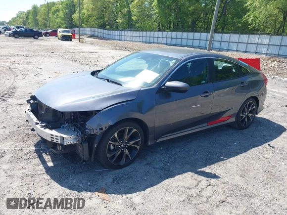 2019 Honda Civic Sport with VIN 2HGFC2F85KH576547, listed as a IAAI auction lot 42024497 with 86,468 mi miles and . Bid and sale history available at DreamBid. Image 17.