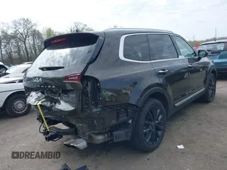 2022 Kia Telluride SX with VIN 5XYP54HC4NG271392, listed as a IAAI auction lot 42019407 with 50,971 mi miles and . Bid and sale history available at DreamBid. Image 4.