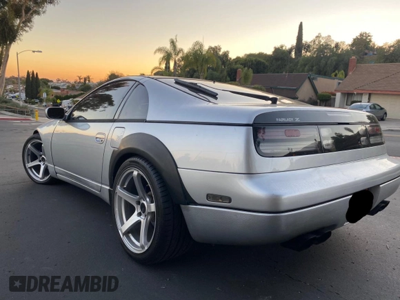 1990 Nissan 300ZX z VIN JN1RZ24A6LX013894, wystawiony jako Copart lot #59821625 z przebiegiem 107 310 mil mil oraz Szkoda całkowita • Salvage title. Historia ofert i sprzedaży dostępna na DreamBid. Obrazek 3.