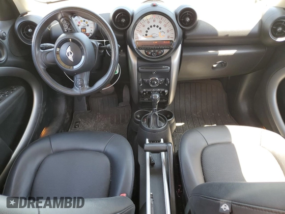 2014 MINI Countryman with VIN WMWZB3C56EWR38919, listed as a Copart auction lot 61385865 with 127,368 mi miles and Salvage title. Bid and sale history available at DreamBid. Image 8.