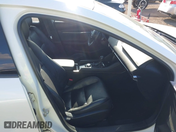 2020 Mazda 3 Premium with VIN 3MZBPAEM3LM132772, listed as a IAAI auction lot 42067269 with 53,751 mi miles and . Bid and sale history available at DreamBid. Image 5.