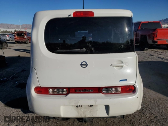 2014 Nissan Cube SL z VIN JN8AZ2KR3ET352338, wystawiony jako Copart lot #41538795 z przebiegiem 131 668 mil mil oraz Szkoda całkowita • Salvage title. Historia ofert i sprzedaży dostępna na DreamBid. Obrazek 6.