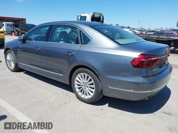 2017 Volkswagen Passat SE with VIN 1VWBT7A3XHC015940, listed as a IAAI auction lot 42027997 with 28,442 mi miles and . Bid and sale history available at DreamBid. Image 3.