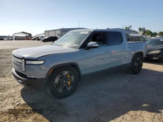 2022 Rivian R1T Adventure z VIN 7FCTGAAA0NN010103, wystawiony jako Copart lot #53312035 z przebiegiem 48 333 mil mil oraz Szkody całkowita. Historia ofert i sprzedaży dostępna na DreamBid. Obrazek 1.