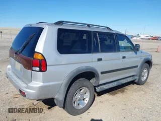 2003 Mitsubishi Montero Sport ES with VIN JA4LS21H23J002736, listed as a IAAI auction lot 41663572 with 235,704 mi miles. Bid and sale history available at carsss.com. Image 4.